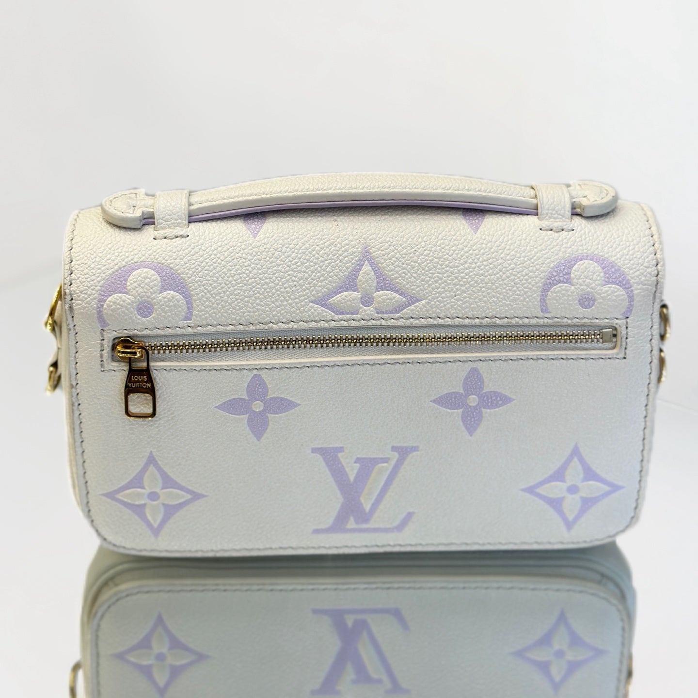 Louis Vuitton Pochette Métis East West in Monogram Empreinte Leather - White/Lilac