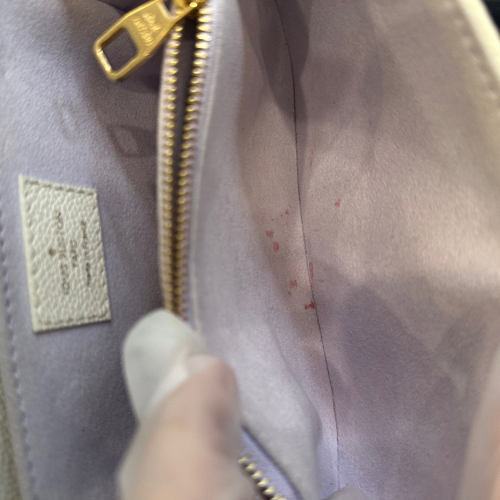 Louis Vuitton Pochette Métis East West in Monogram Empreinte Leather - White/Lilac