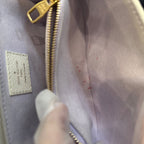 Louis Vuitton Pochette Métis East West in Monogram Empreinte Leather - White/Lilac