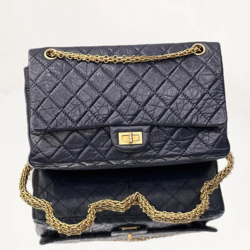 Pre-Owned - Chanel Reissue 2.55 Classic Flap Bag in Aged Midnight Blue Calfskin and Gold-Tone Hardware Authentic Luxury by LUXE LINK