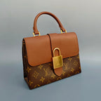 Louis Vuitton Locky BB in Monogram Canvas and Tan Leather