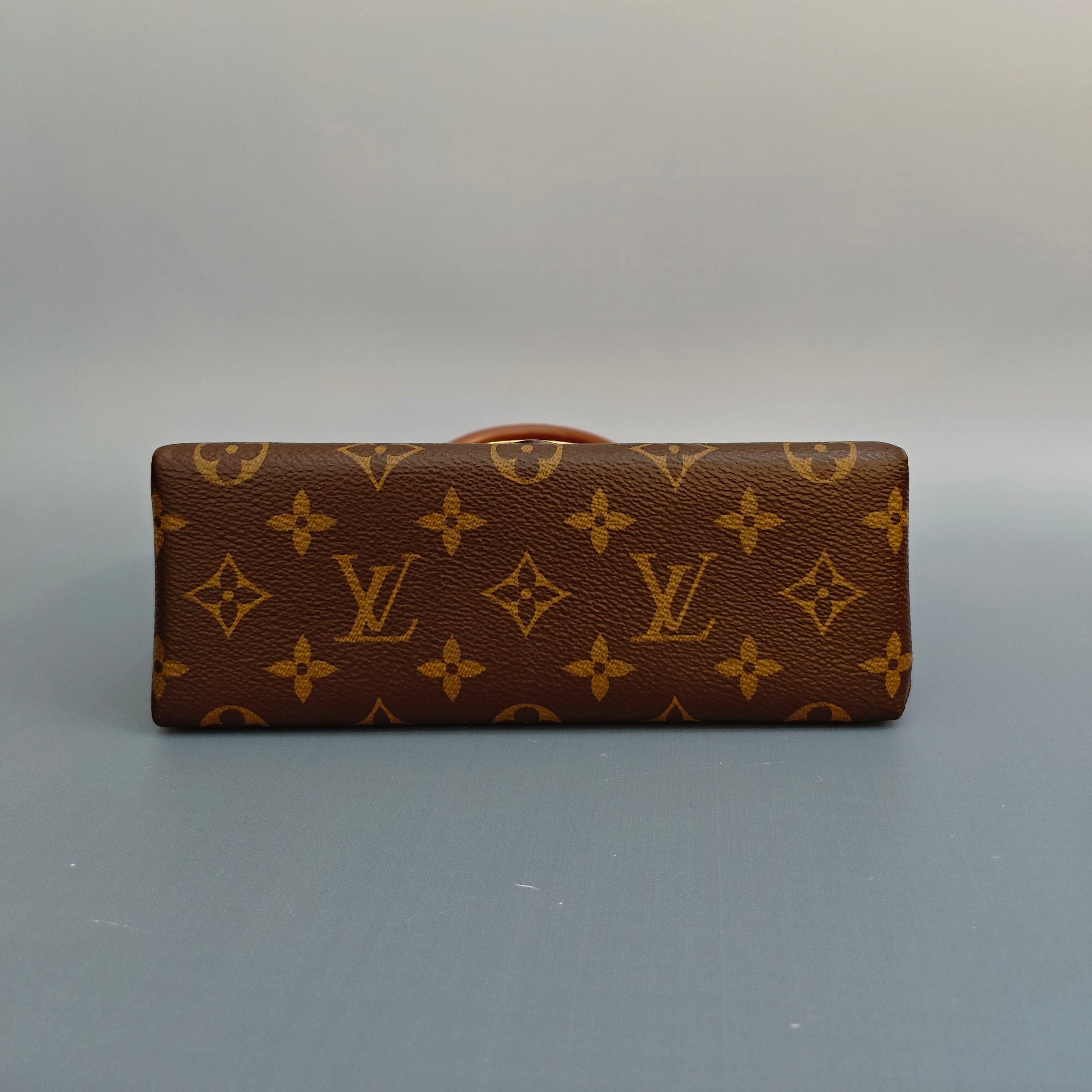 Louis Vuitton Locky BB in Monogram Canvas and Tan Leather