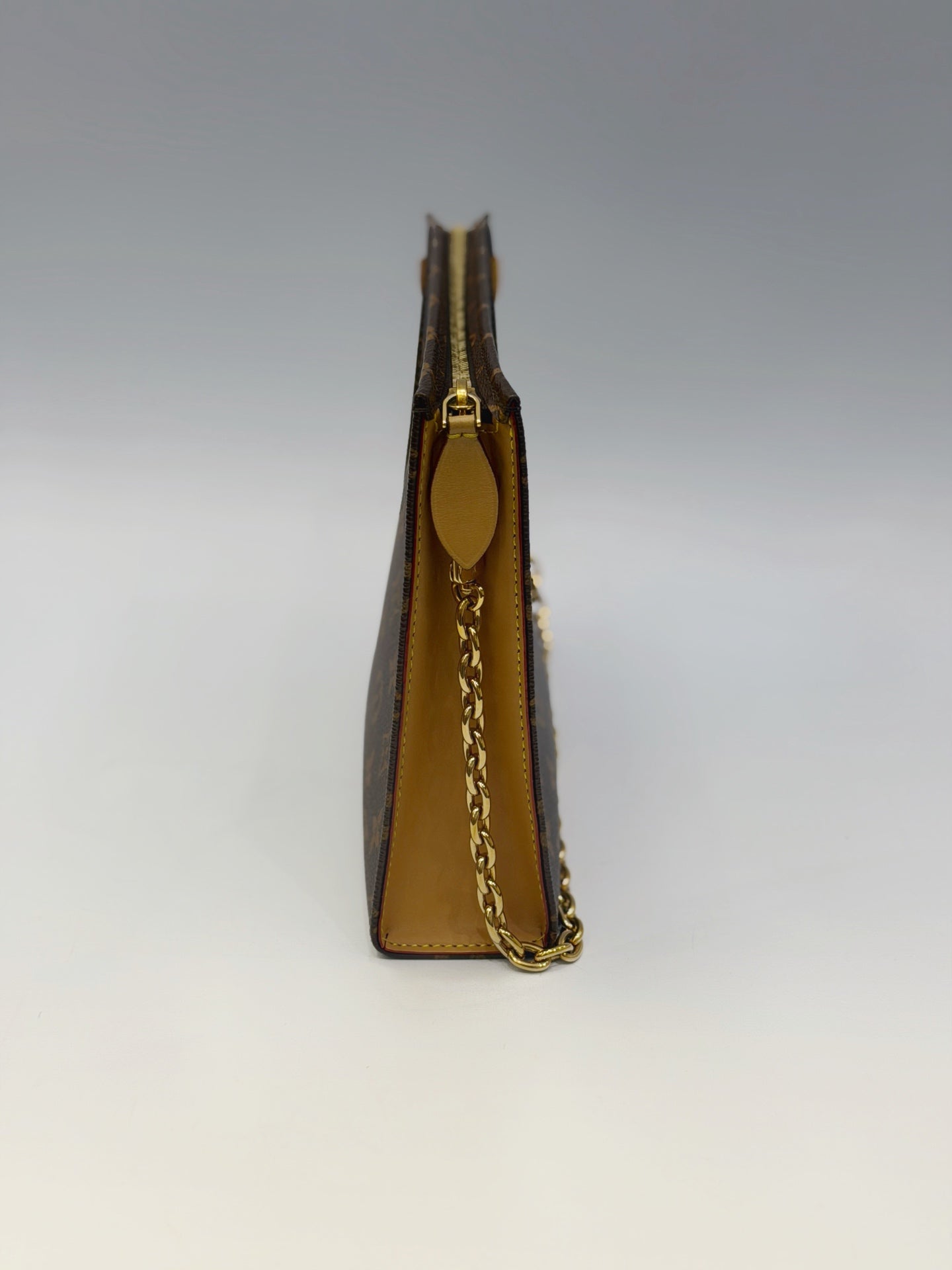 Louis Vuitton Toiletry Pouch On Chain – Iconic Monogram Canvas with Gold-Tone Hardware
