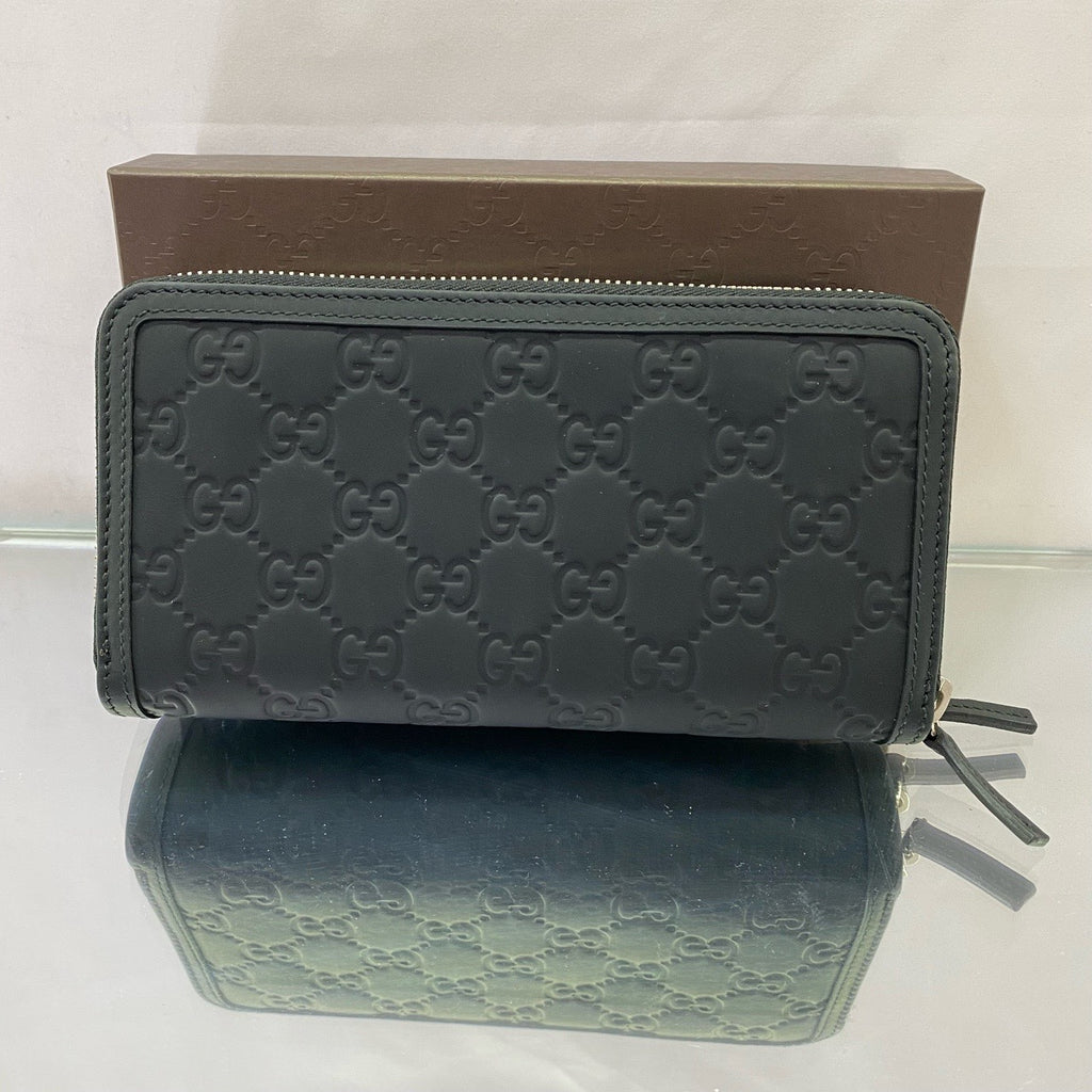 Gucci Signature Zip Around Wallet – Black Debossed Guccissima Leather
