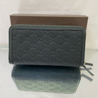 Gucci Signature Zip Around Wallet – Black Debossed Guccissima Leather
