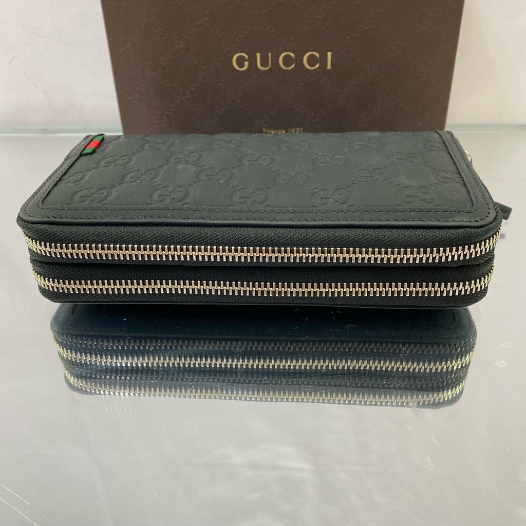 Gucci Signature Zip Around Wallet – Black Debossed Guccissima Leather