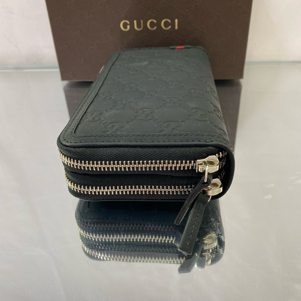 Gucci Signature Zip Around Wallet – Black Debossed Guccissima Leather