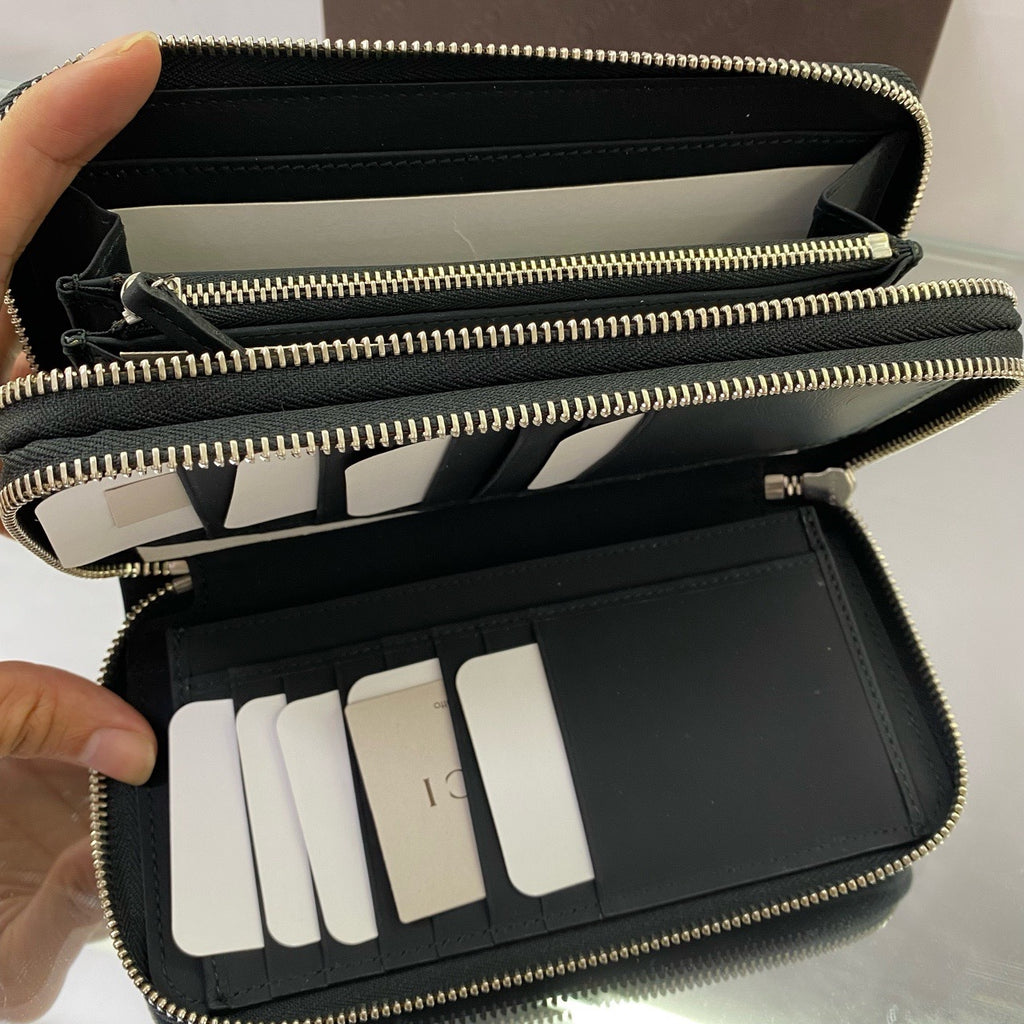 Gucci Signature Zip Around Wallet – Black Debossed Guccissima Leather