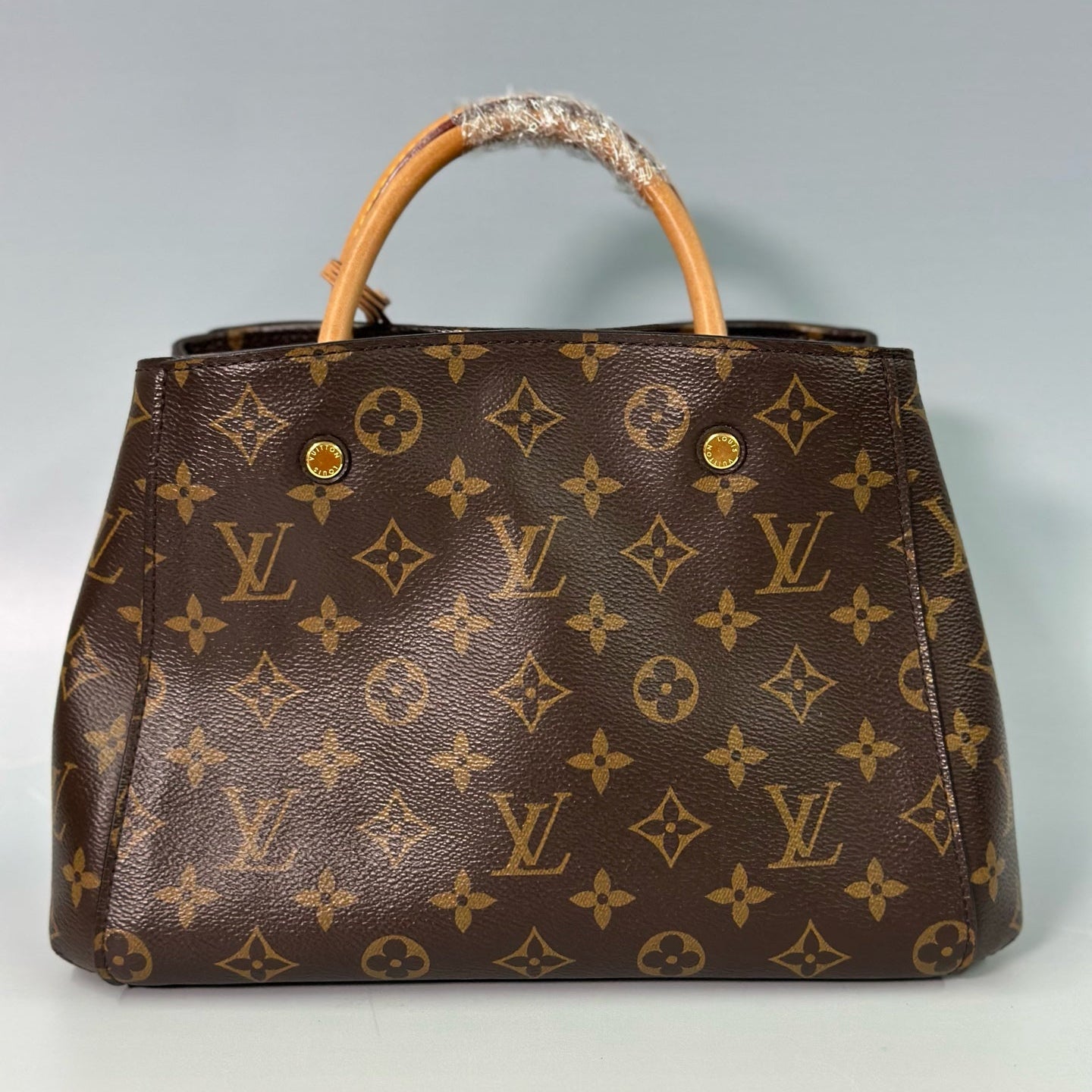 Louis Vuitton Montaigne BB – Monogram Canvas Top Handle Bag with Vachetta Leather Trim and Crossbody Strap