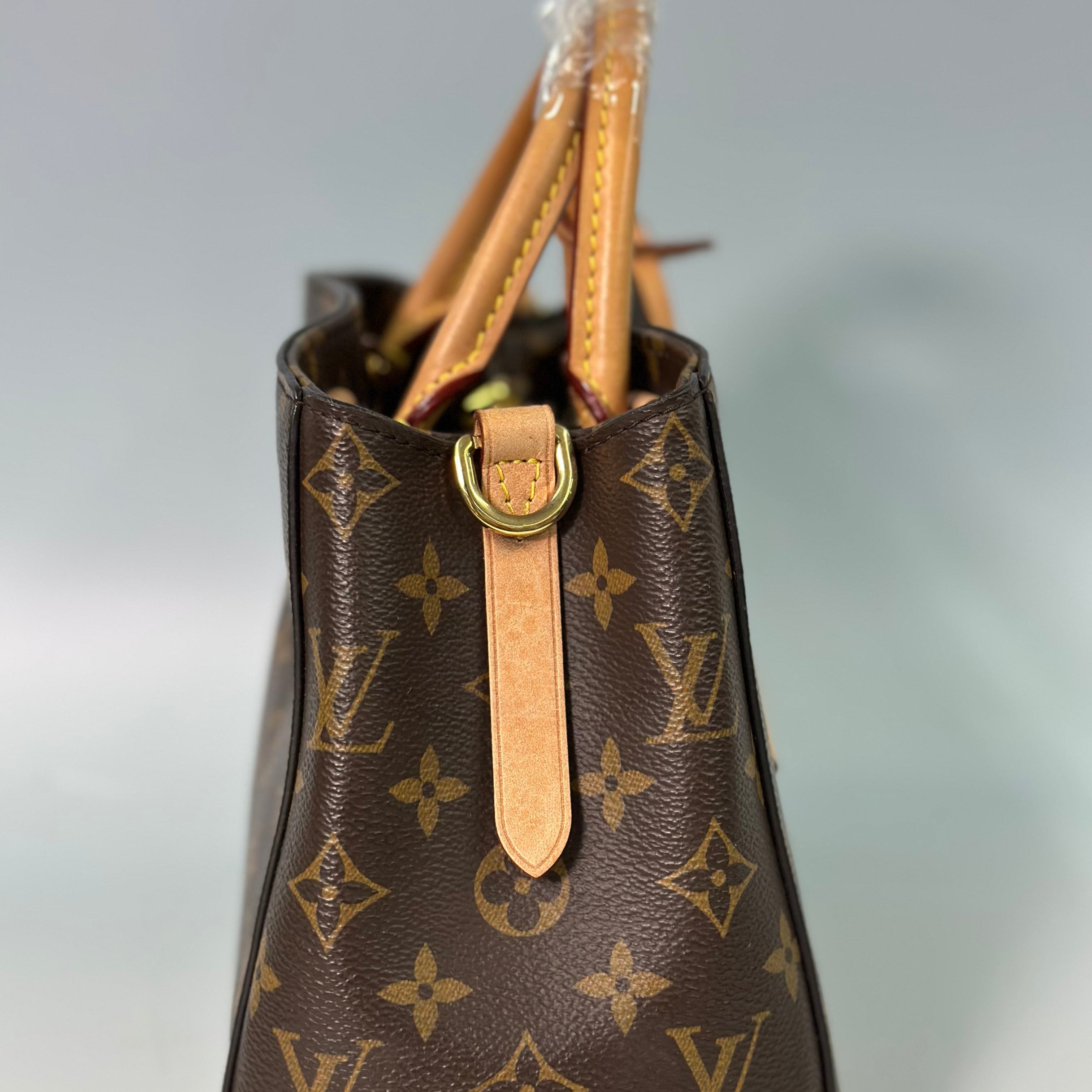 Louis Vuitton Montaigne BB – Monogram Canvas Top Handle Bag with Vachetta Leather Trim and Crossbody Strap