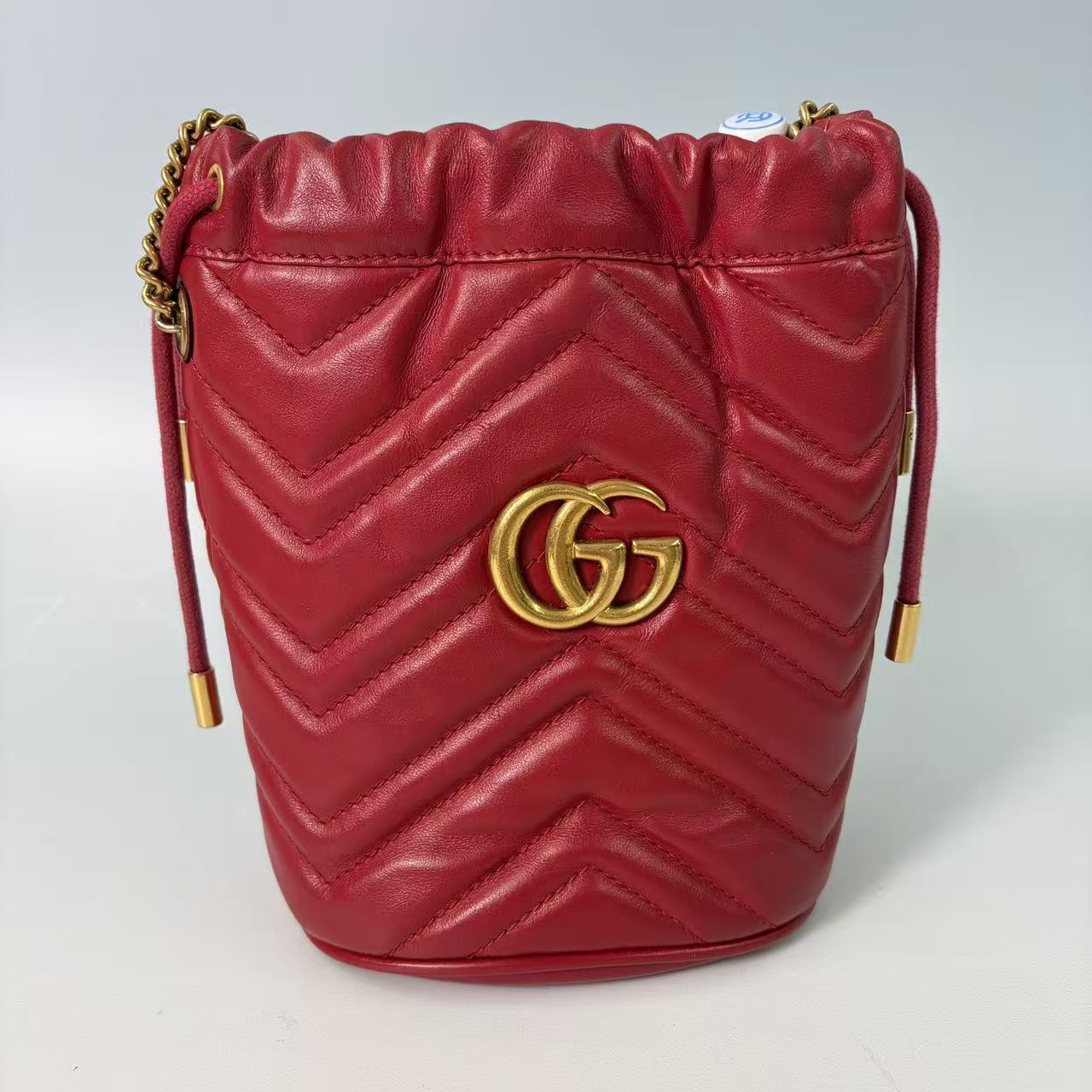 Gucci GG Marmont Mini Matelassé Bucket Bag in Red Leather