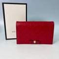 Gucci Signature (Guccissima) Leather Bow Chain Wallet in Red