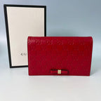 Gucci Signature (Guccissima) Leather Bow Chain Wallet in Red