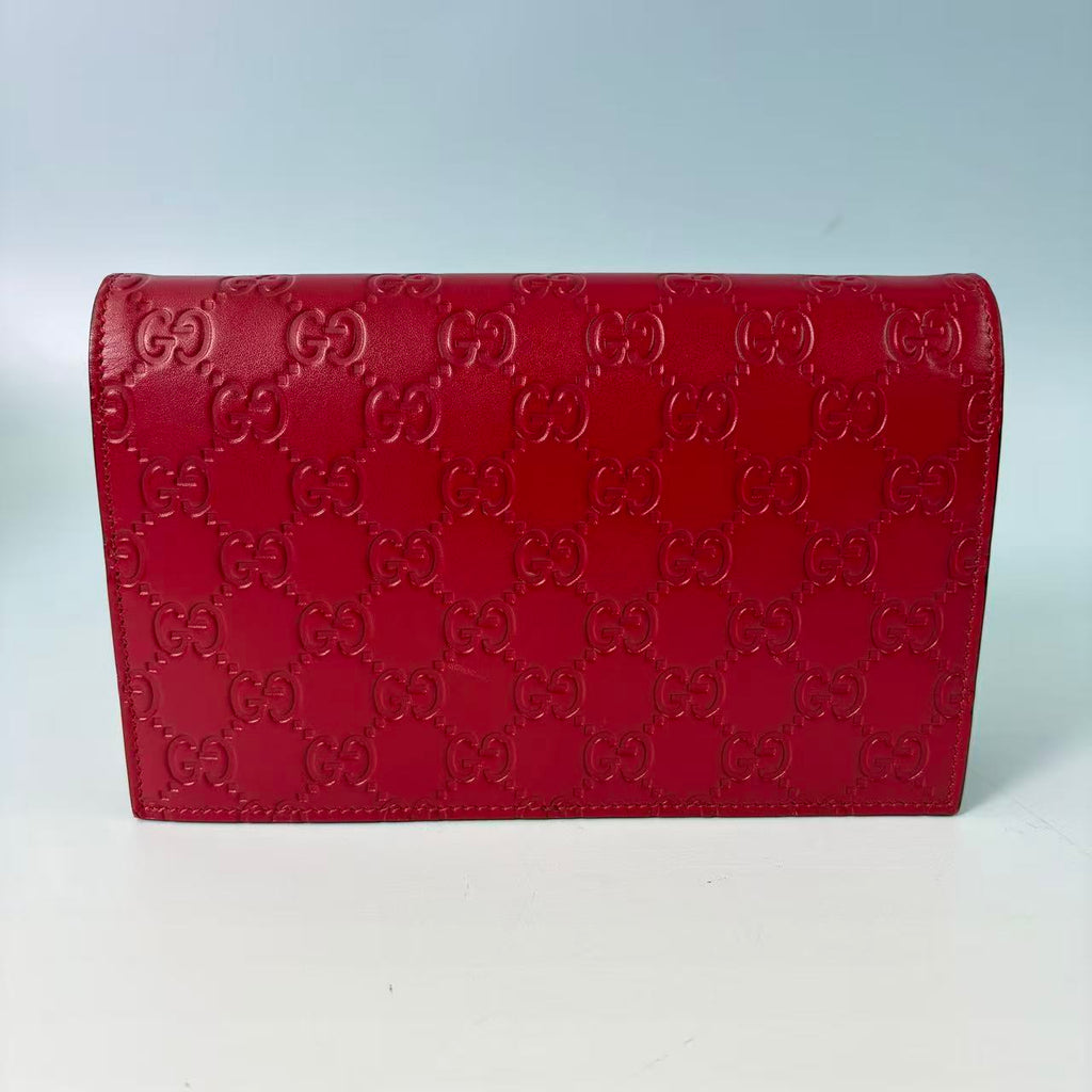Gucci Signature (Guccissima) Leather Bow Chain Wallet in Red
