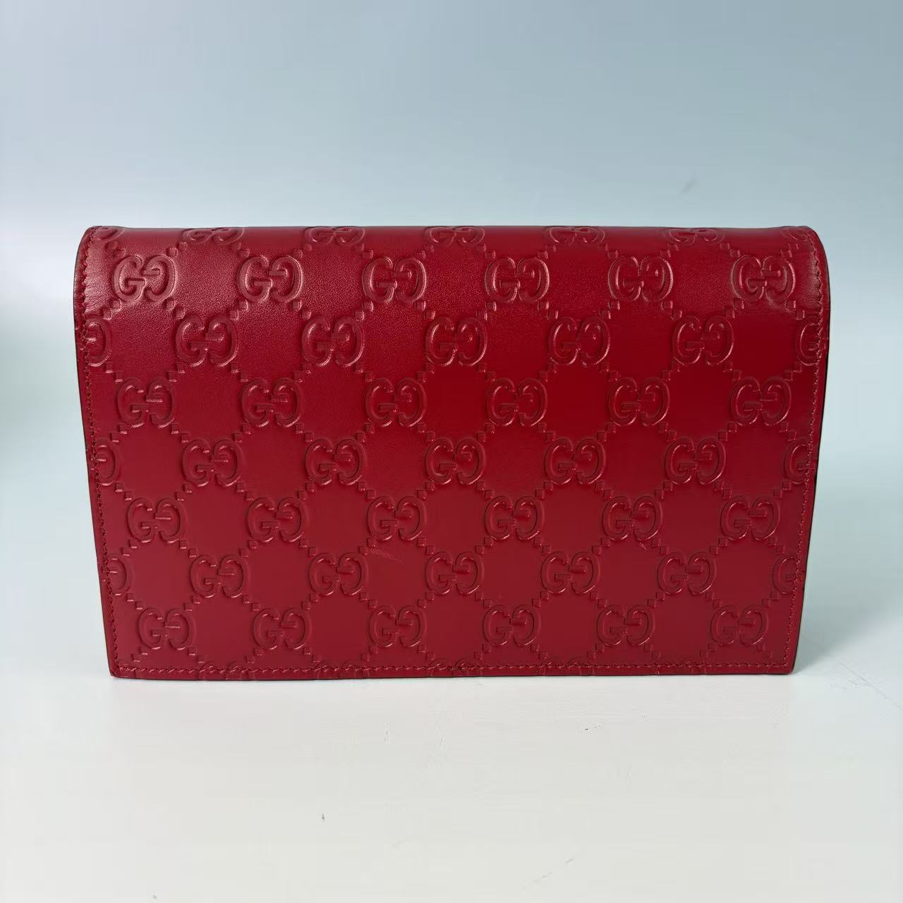 Gucci Signature (Guccissima) Leather Bow Chain Wallet in Red