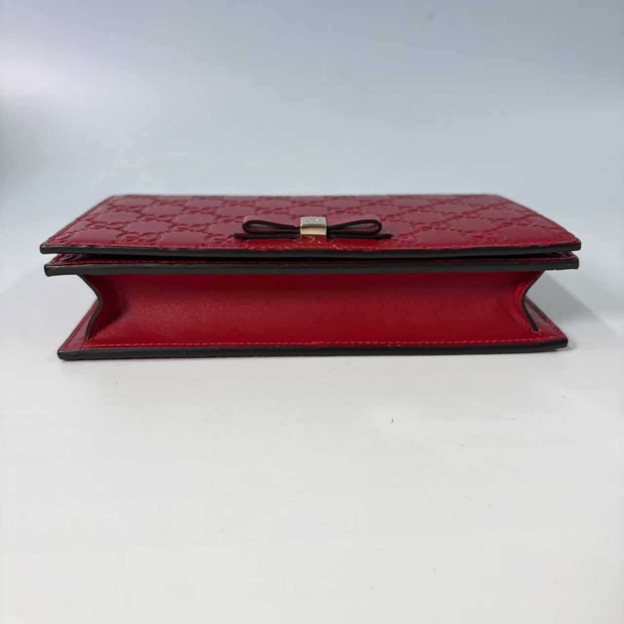 Gucci Signature (Guccissima) Leather Bow Chain Wallet in Red
