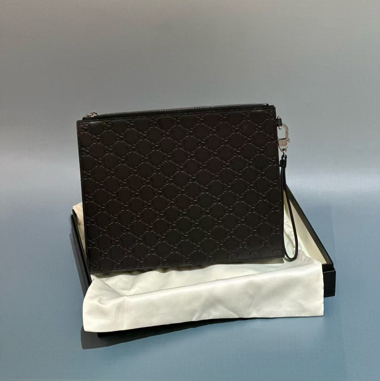 Gucci Signature Leather Pouch with Wristlet