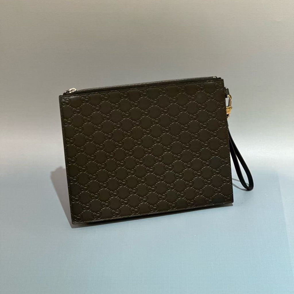 Gucci Signature Leather Pouch with Wristlet