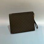 Gucci Signature Leather Pouch with Wristlet