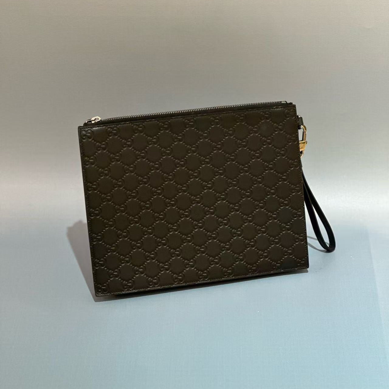 Gucci Signature Leather Pouch with Wristlet