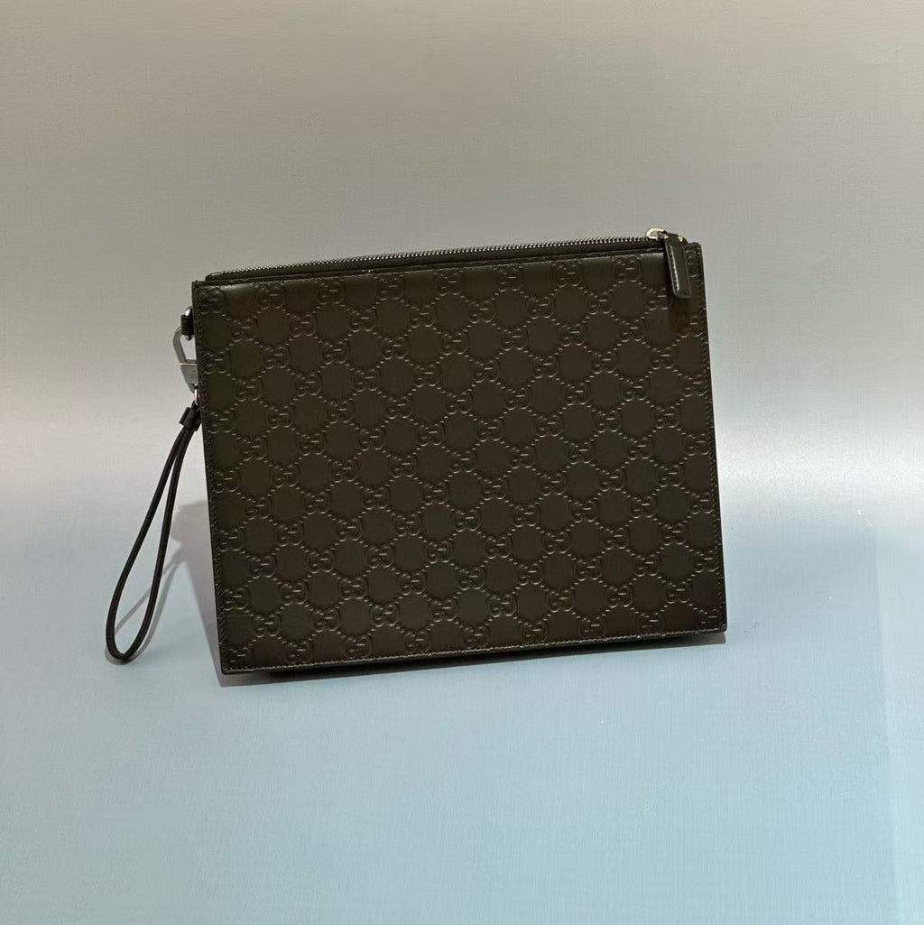 Gucci Signature Leather Pouch with Wristlet