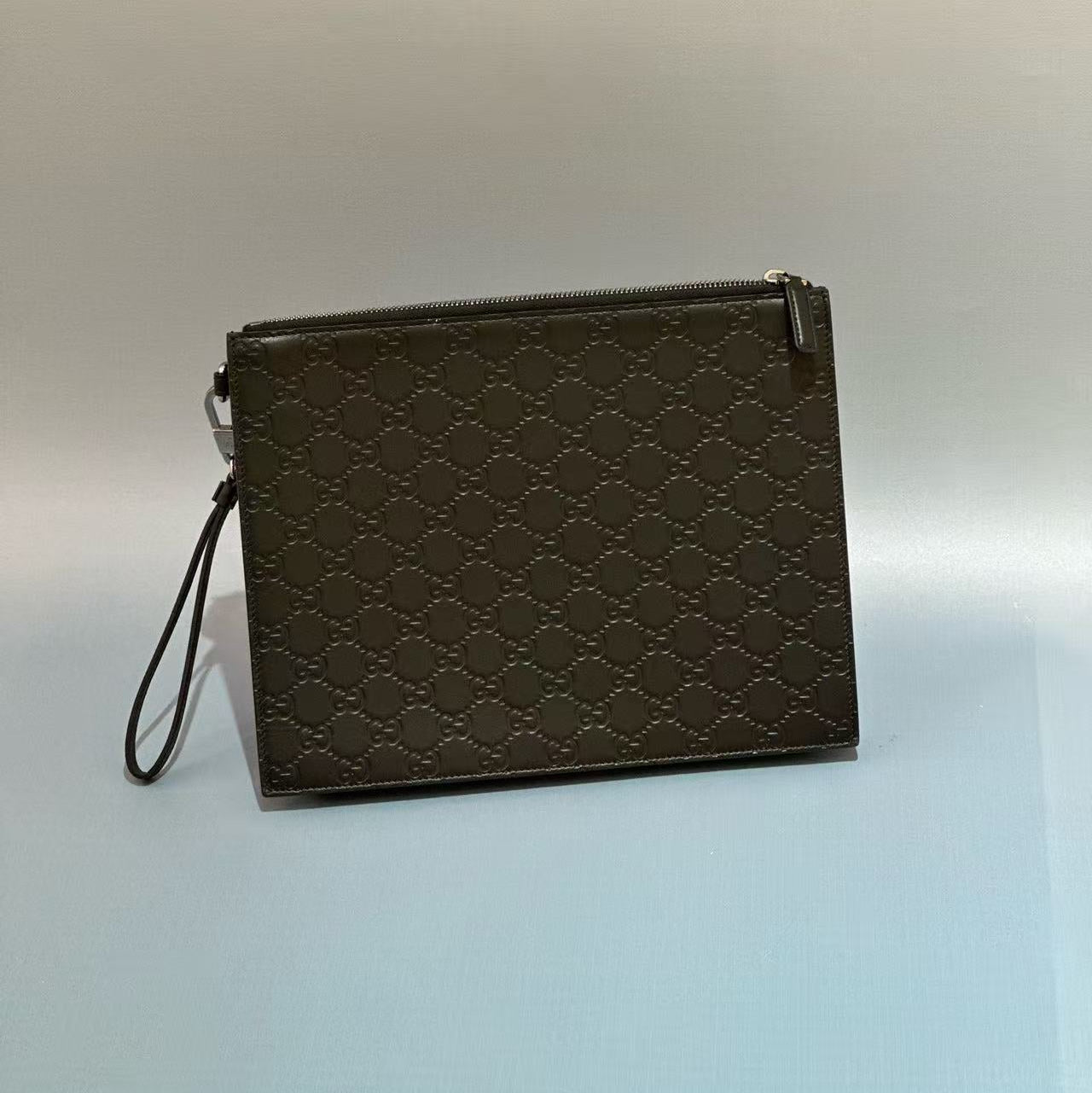 Gucci Signature Leather Pouch with Wristlet