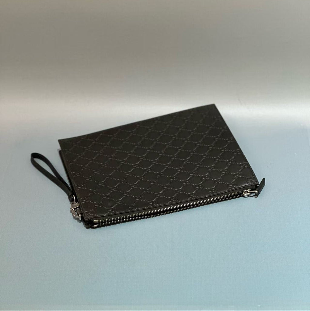 Gucci Signature Leather Pouch with Wristlet