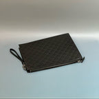 Gucci Signature Leather Pouch with Wristlet
