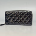 Chanel Classic Zipped Wallet in Black Quilted Patent Leather