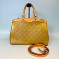 Louis Vuitton Monogram Vernis Brea in Gold