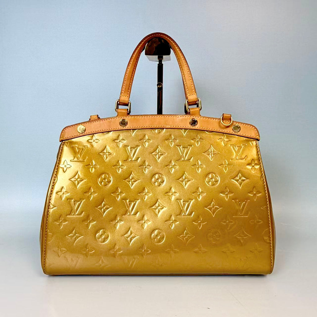 Louis Vuitton Monogram Vernis Brea in Gold