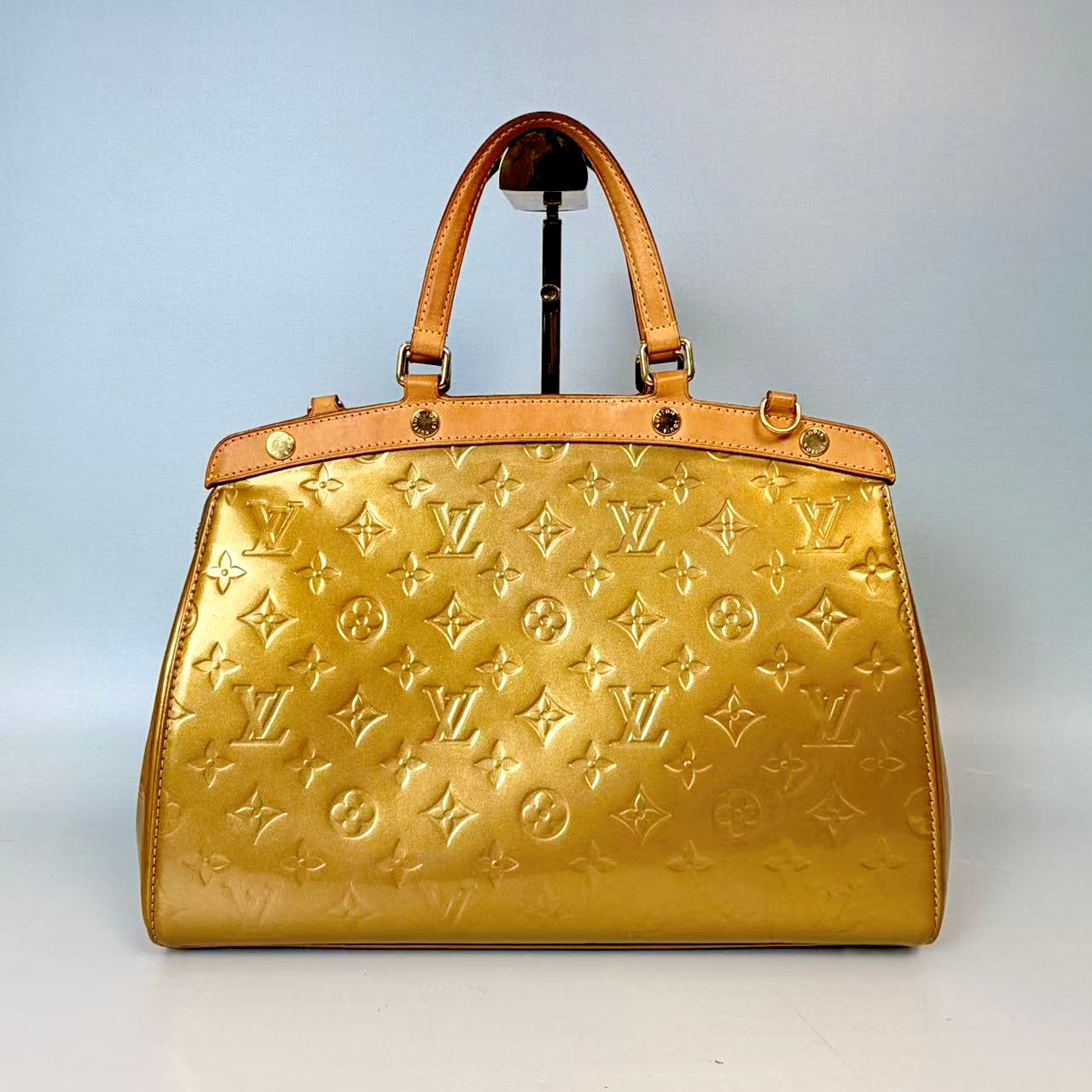 Louis Vuitton Monogram Vernis Brea in Gold