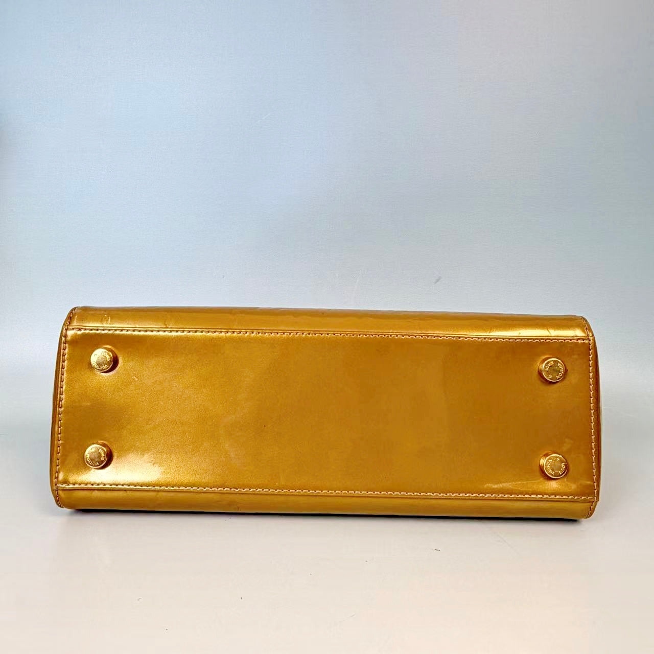 Louis Vuitton Monogram Vernis Brea in Gold