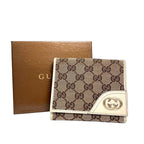 Gucci Interlocking G GG Canvas French Flap Wallet in Beige & White