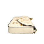 Louis Vuitton Monogram Empreinte Félicie Pochette in Cream/Saffron